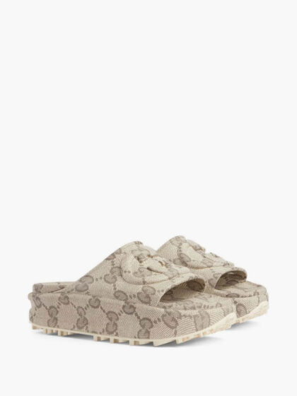Monogram canvas slip-on mules by CIELOR