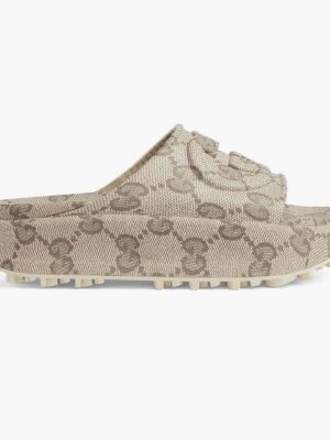 Monogram canvas slip-on mules by CIELOR